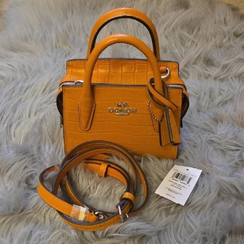 Authentic Coach croc-embossed mini top handle bag in a stunning washed orange